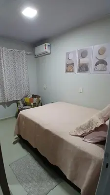 Uma cama ou camas num quarto em Casa completa a 15 cuadras de la playa