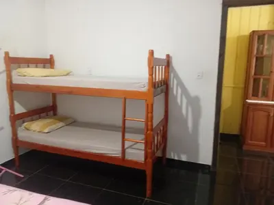 Uma cama ou camas num quarto em Praia Itapema