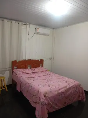 Uma cama ou camas num quarto em Praia Itapema