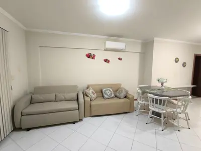 Uma área de estar em Apartamento em Bombinhas