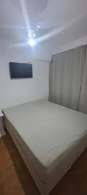 Uma cama ou camas num quarto em Balneário Camboriú