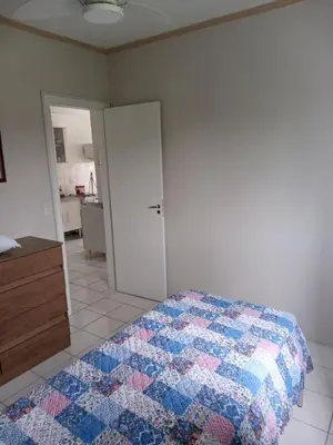 Uma cama ou camas num quarto em Apto 2 Qtos c AR-Baln Camboriu-Portaria 24hr