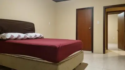 Uma cama ou camas num quarto em Sitio Terra Nova