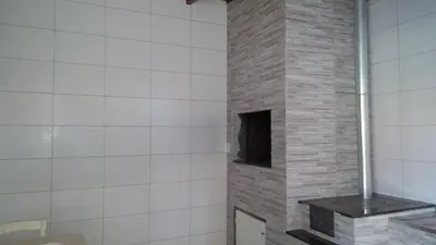 Uma casa de banho em Ótima Casa em Itapema SC