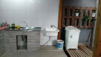 Uma casa de banho em Ótima Casa em Itapema SC