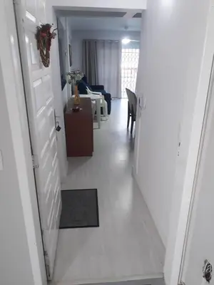 Uma cama ou camas num quarto em Lindo apartamento próximo a praia em Itapema - SC!