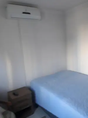 Uma cama ou camas num quarto em Lindo apartamento próximo a praia em Itapema - SC!