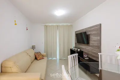 Uma televisão e/ou sistema de entretenimento em Apto 2Q c/ churrasq. 400m praia CAN304