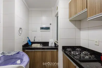 A cozinha ou kitchenette de Apto 2Q c/ churrasq. 400m praia CAN304
