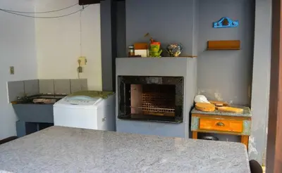 Uma cama ou camas num quarto em Sobrado Familiar da Salete 01