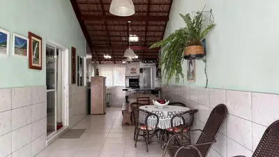 A cozinha ou kitchenette de casa espaçosa para ate 10 pessoas em Bombinhas