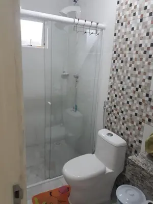 Uma casa de banho em casa espaçosa para ate 10 pessoas em Bombinhas