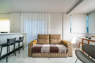 Uma área de estar em Lindo apartamento na praia de Mariscal