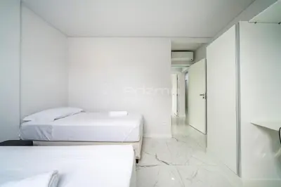 Uma cama ou camas num quarto em Lindo apartamento na praia de Mariscal