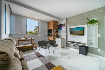 Uma televisão e/ou sistema de entretenimento em Lindo apartamento na praia de Mariscal