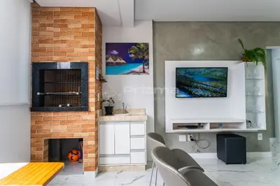 Uma televisão e/ou sistema de entretenimento em Lindo apartamento na praia de Mariscal