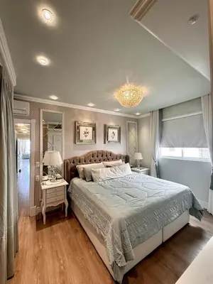 Uma cama ou camas num quarto em Pé na Areia Luxo Itapema Apto