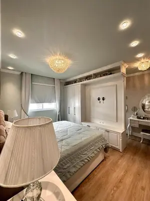 Uma cama ou camas num quarto em Pé na Areia Luxo Itapema Apto