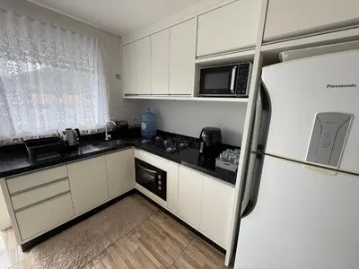 A cozinha ou kitchenette de Hospedagem da Marli