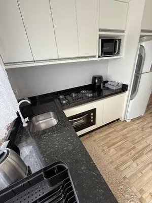A cozinha ou kitchenette de Hospedagem da Marli