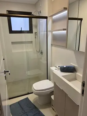 Uma casa de banho em Apartamento Pé na Areia