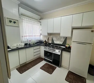 A cozinha ou kitchenette de Apartamento 150 metros da praia