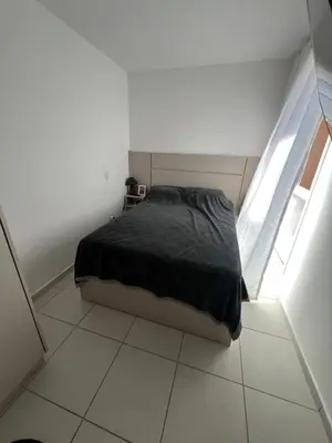 Uma cama ou camas num quarto em Vista Atlântico