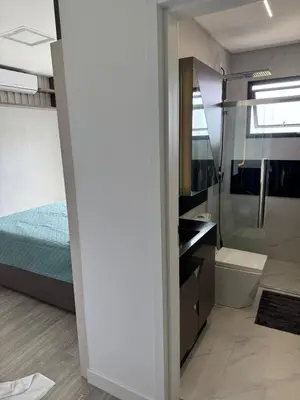 Uma cama ou camas num quarto em Suite exclusive vista mar