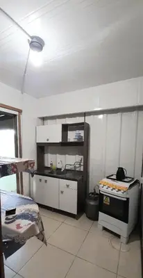 A cozinha ou kitchenette de Apart no centro de Porto Belo