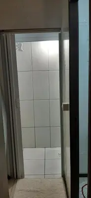 Uma casa de banho em Apart no centro de Porto Belo