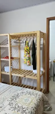 Uma cama ou camas num quarto em Casa Piscina Bombinhas 10 Pessoas