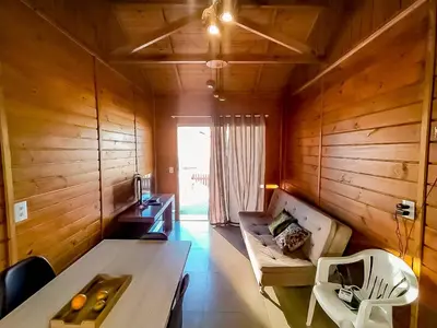 Uma área de estar em Casa Piscina Bombinhas 10 Pessoas