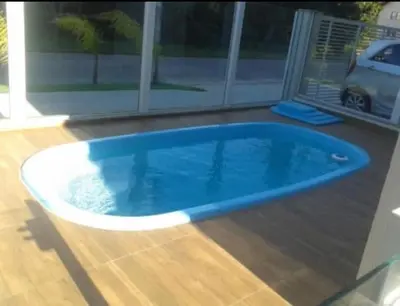 A piscina em ou perto de Lindo apartamento na Praia de Palmas