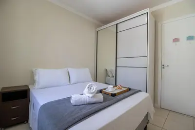 Uma cama ou camas num quarto em QUA21 - 3Dorm, Churrasqueira na sacada, Garagem
