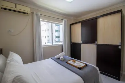 Uma cama ou camas num quarto em QUA21 - 3Dorm, Churrasqueira na sacada, Garagem