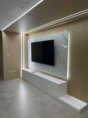 Uma televisão e/ou sistema de entretenimento em Modern apartment