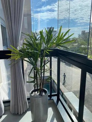 Uma varanda ou terraço em Apart Luxo Palmas Beach 200m com garagem