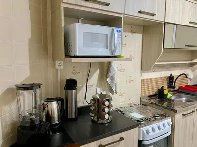 A cozinha ou kitchenette de Apê 120m do mar, perto de tudo