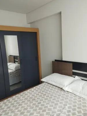 Uma cama ou camas num quarto em Apartamento Itapema 3 quartos