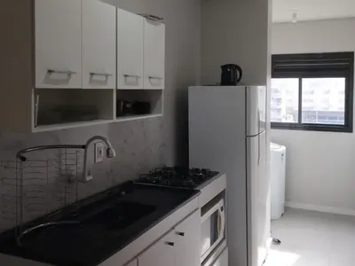 A cozinha ou kitchenette de Apartamento Itapema 3 quartos