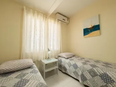 Uma cama ou camas num quarto em 3 bedroom apartament with terrace