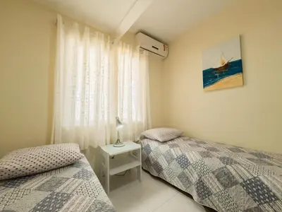 Uma cama ou camas num quarto em 3 bedroom apartament with terrace