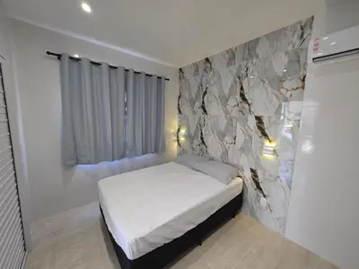 Uma cama ou camas num quarto em RB House