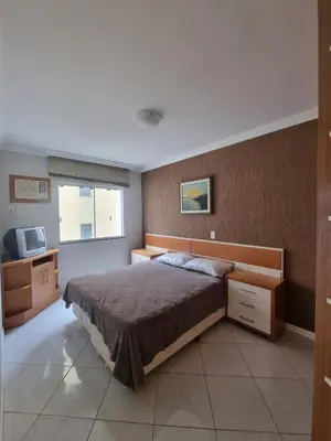 Uma cama ou camas num quarto em Apartamento Itapema Meia Praia