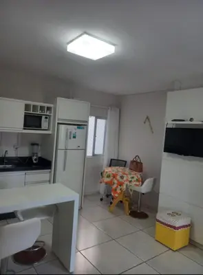 A cozinha ou kitchenette de Apartamento quadra mar meia praia