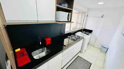 A cozinha ou kitchenette de AP near the beach with barbecue