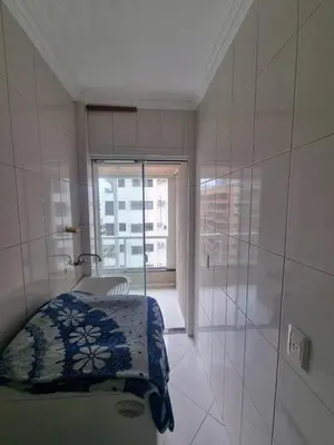 Uma cama ou camas num quarto em Apartamento Itapema Meia Praia