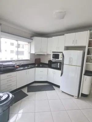 A cozinha ou kitchenette de Apartamento Itapema Meia Praia