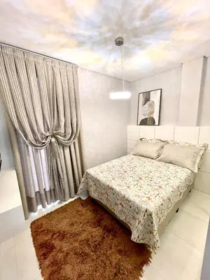 Uma cama ou camas num quarto em Apartamento Brisa do Mar - Ed Galileu