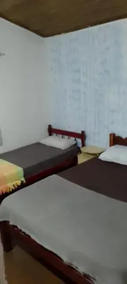 Uma cama ou camas num quarto em Residencial verde oliva AP 3